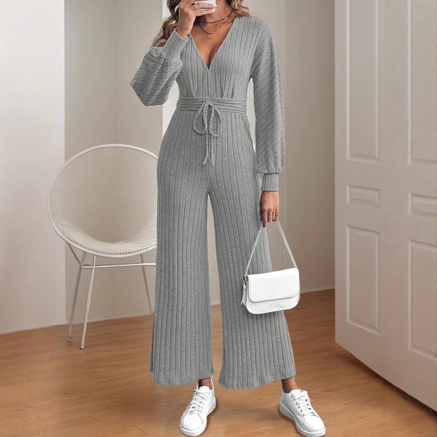 Damen Strickoverall mit tiefem V-Ausschnitt und Taillengürtel Stalluxe