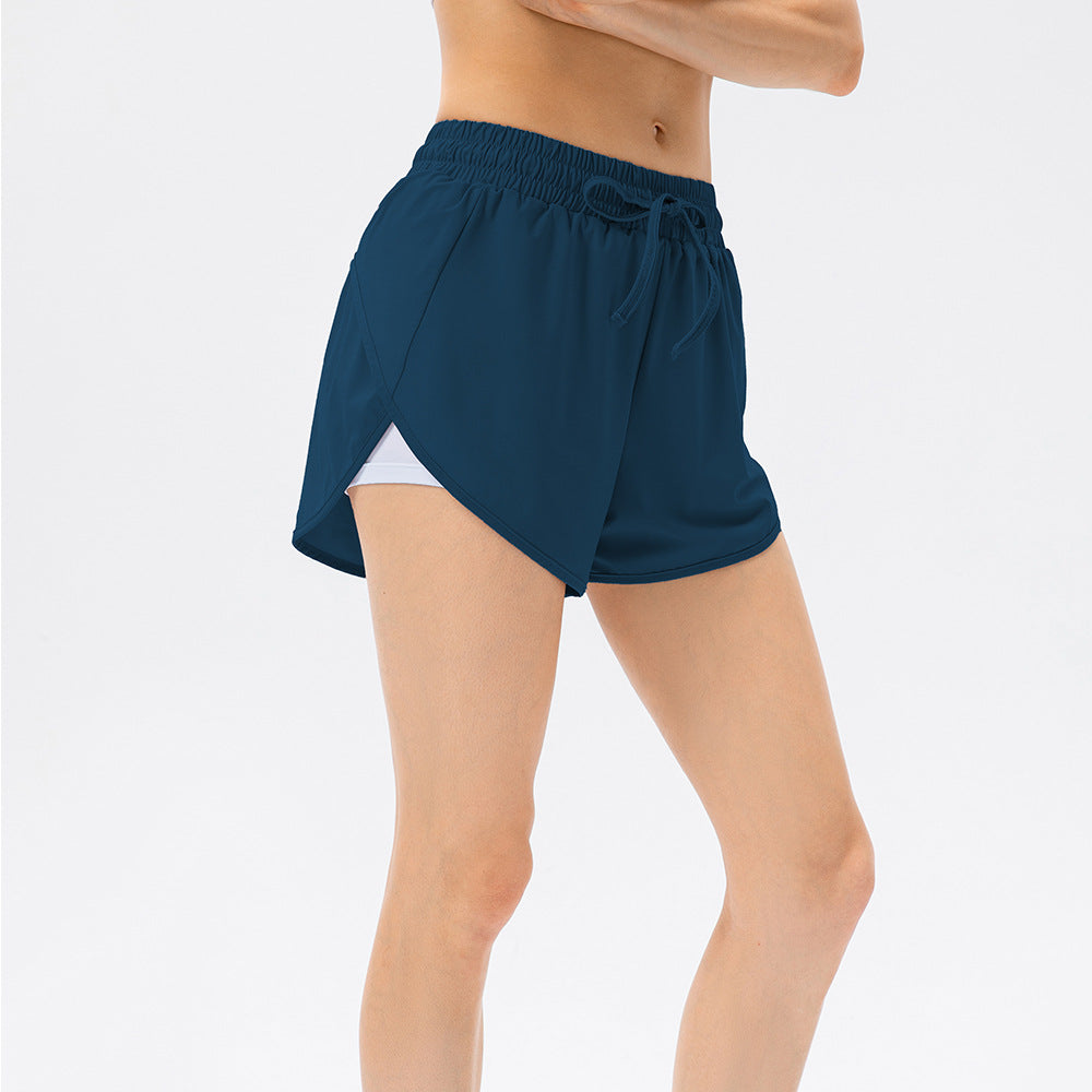 Damen Sportliche Laufshorts mit elastischem Bund und seitlichen Schlitzen Stalluxe
