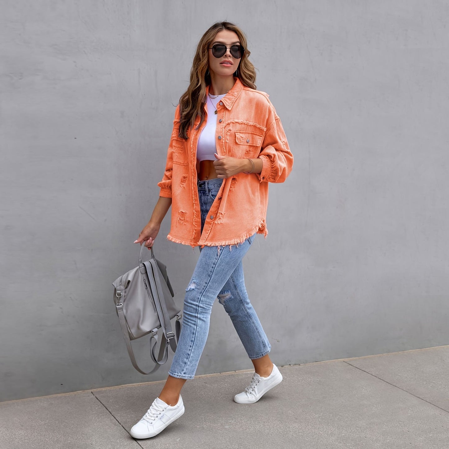 Damen oversized Jeansjacke mit fransigen Säumen und aufgesetzten Taschen Stalluxe