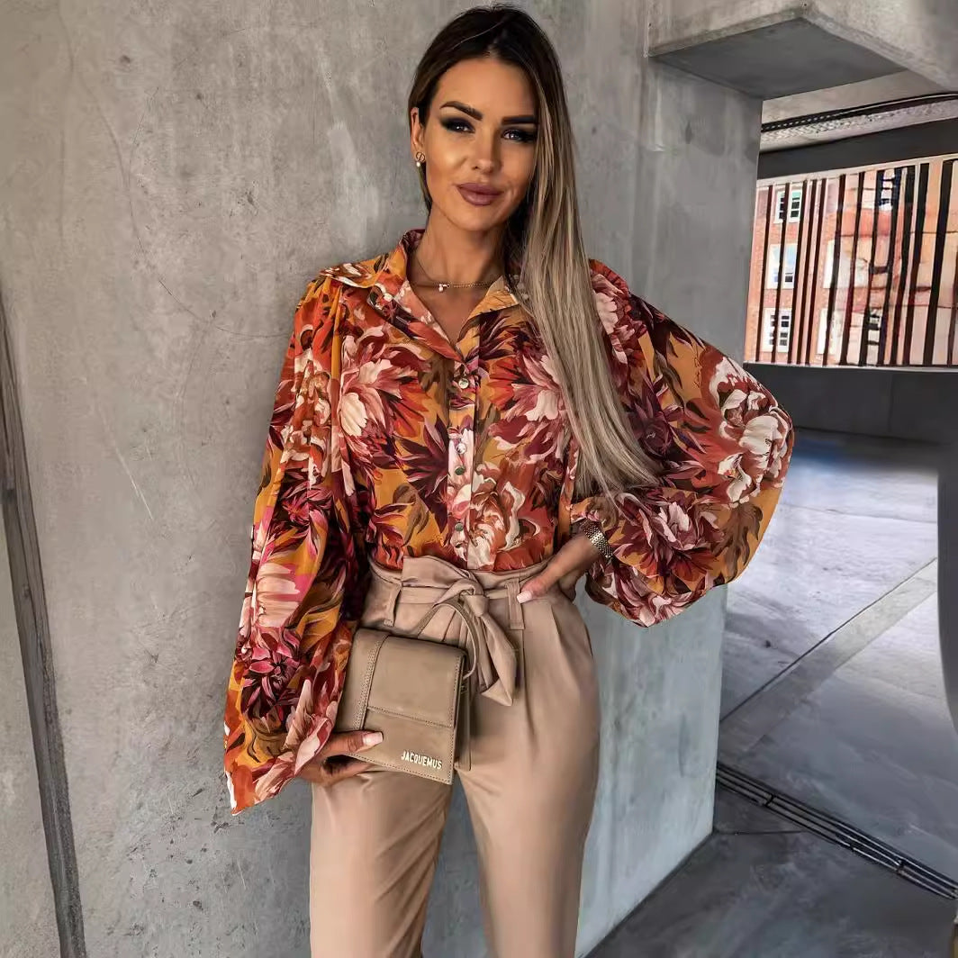 Damen Modebluse mit voluminösen Ärmeln und elegantem Print Stalluxe