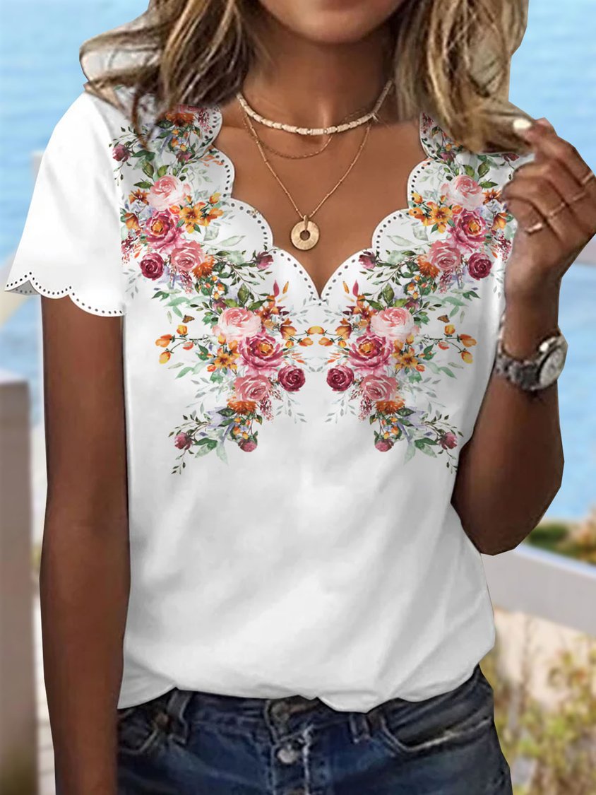 Damen Elegante Bluse mit floralen Stickereien und asymmetrischem Saum Stalluxe