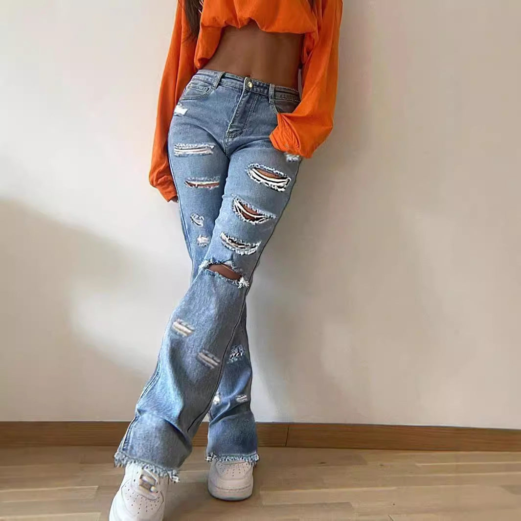Damen Flared Jeans mit modischen Rissdetails und fransigem Saum Stalluxe
