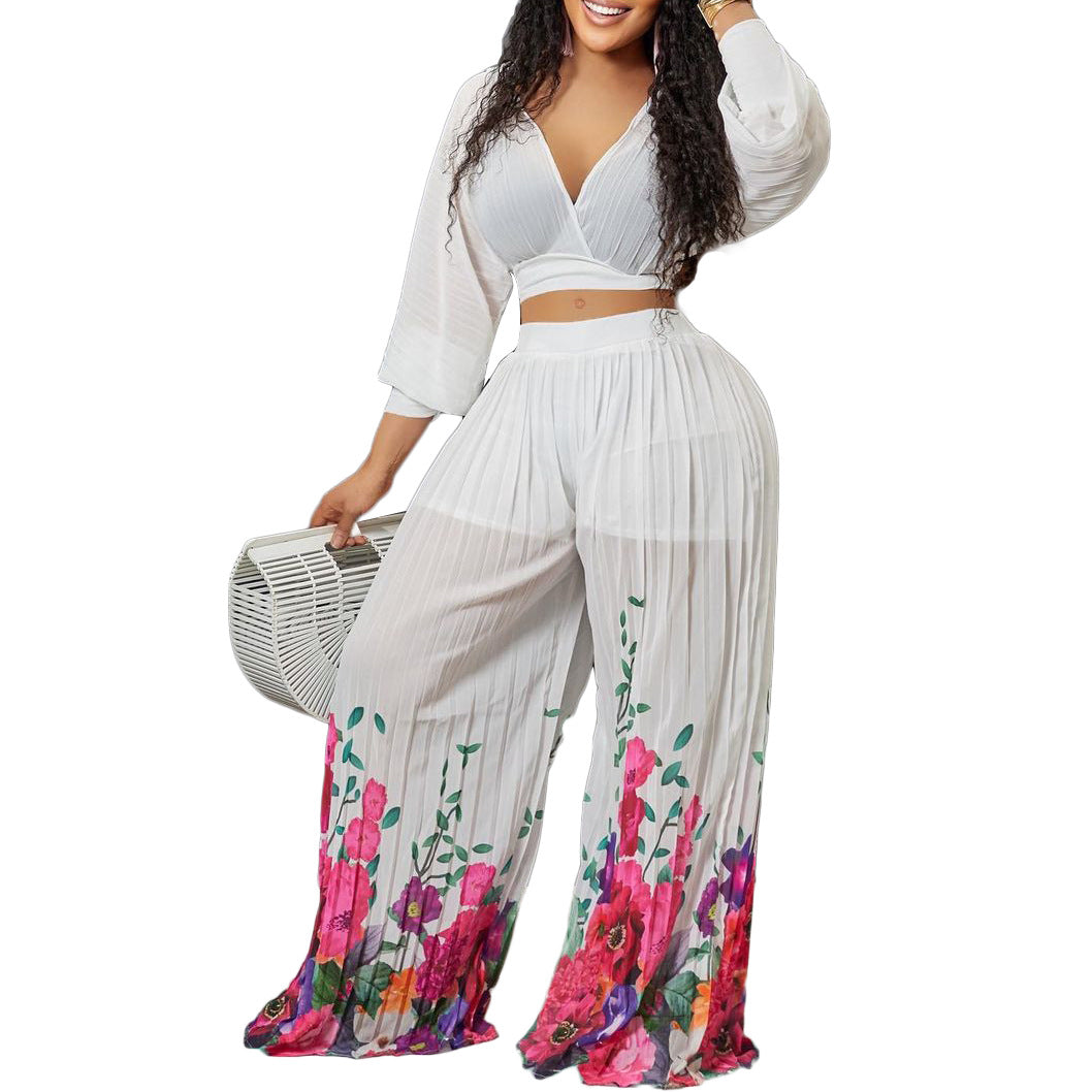 Damen Plissee Jumpsuit mit floralem Print und weitem Bein Stalluxe
