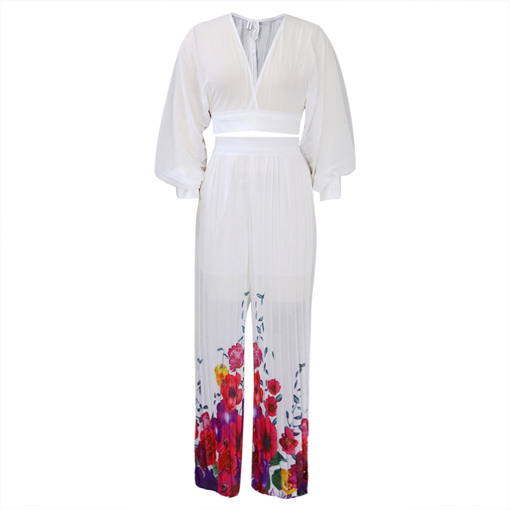 Damen Plissee Jumpsuit mit floralem Print und weitem Bein Stalluxe