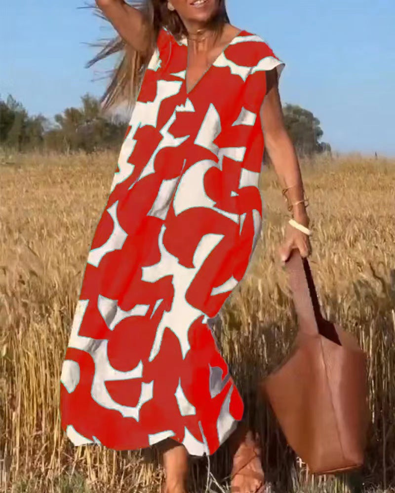 Damen lässiges Maxikleid mit kreativem Muster und tiefem V-Ausschnitt Stalluxe