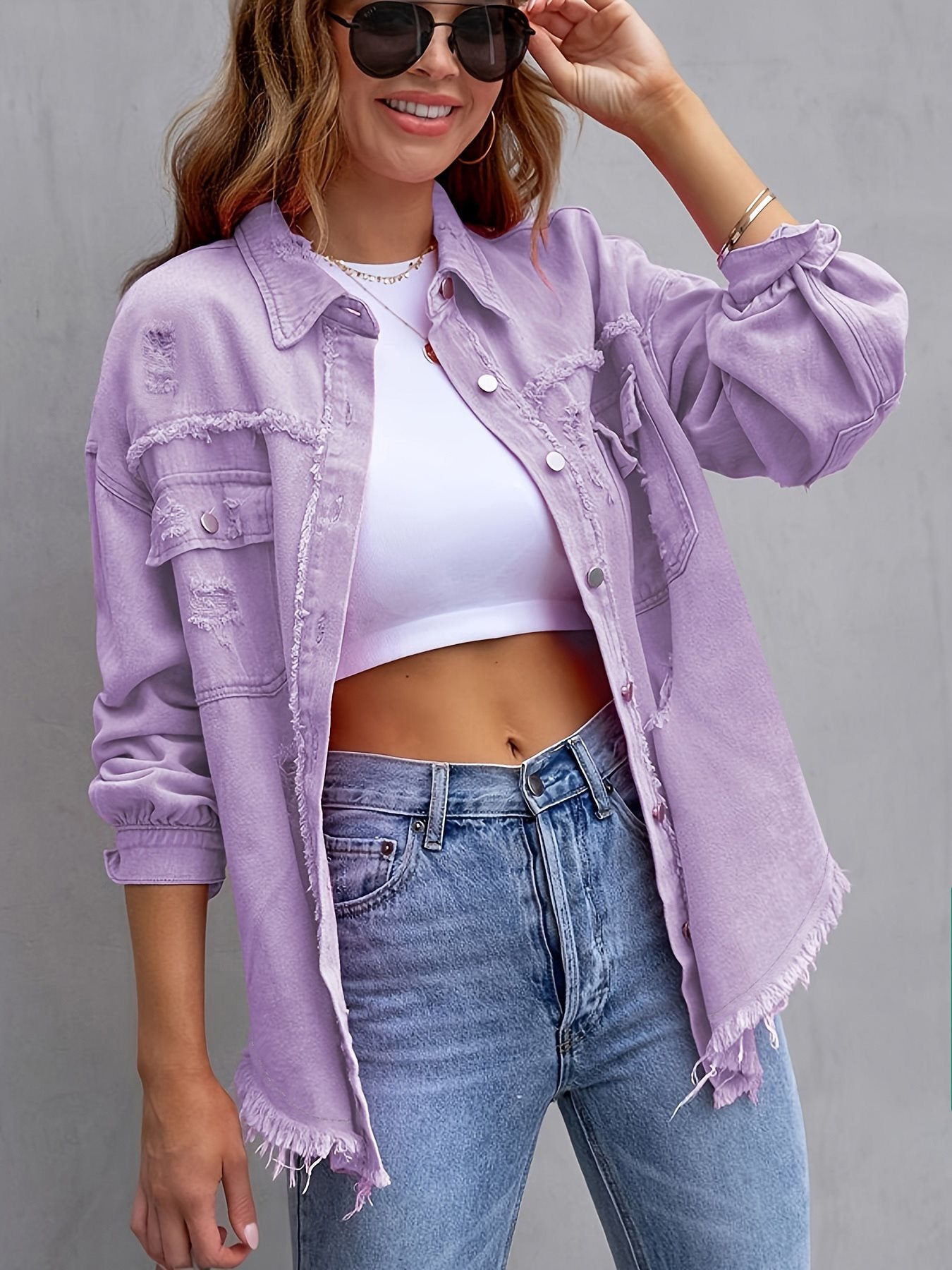 Damen oversized Jeansjacke mit fransigen Säumen und aufgesetzten Taschen Stalluxe