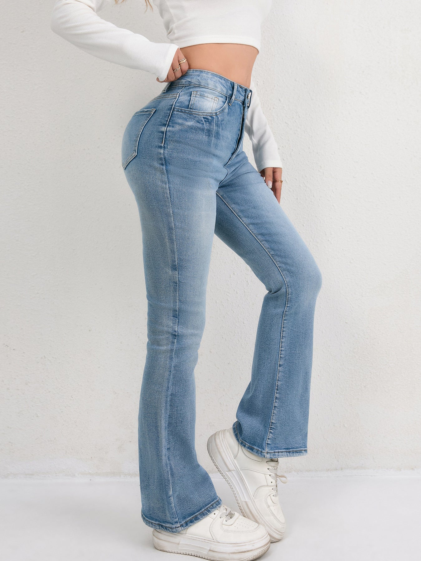 Damen Schlagjeans mit hohem Bund und figurformendem Design Stalluxe