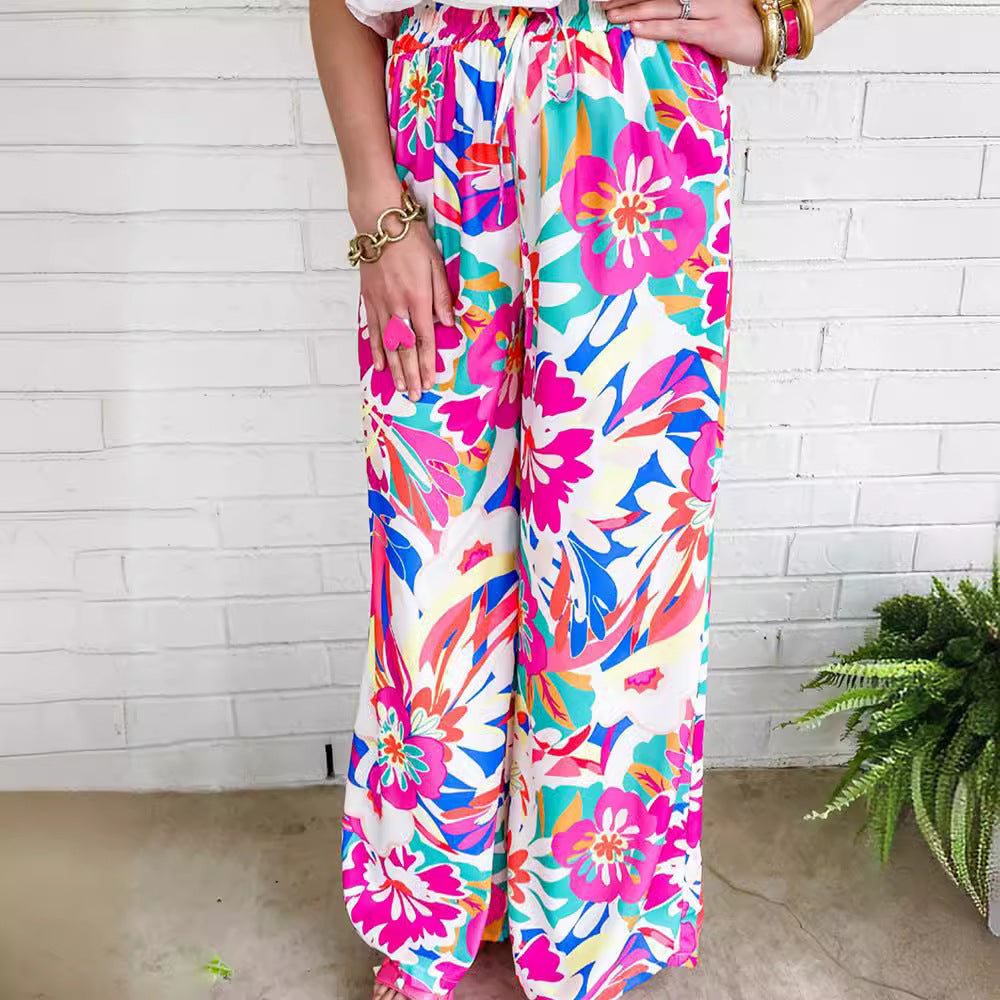 Damen Weit geschnittene Freizeithose mit buntem Blumenmuster und elastischem Bund Stalluxe