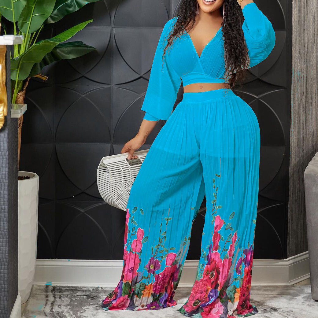 Damen Plissee Jumpsuit mit floralem Print und weitem Bein Stalluxe