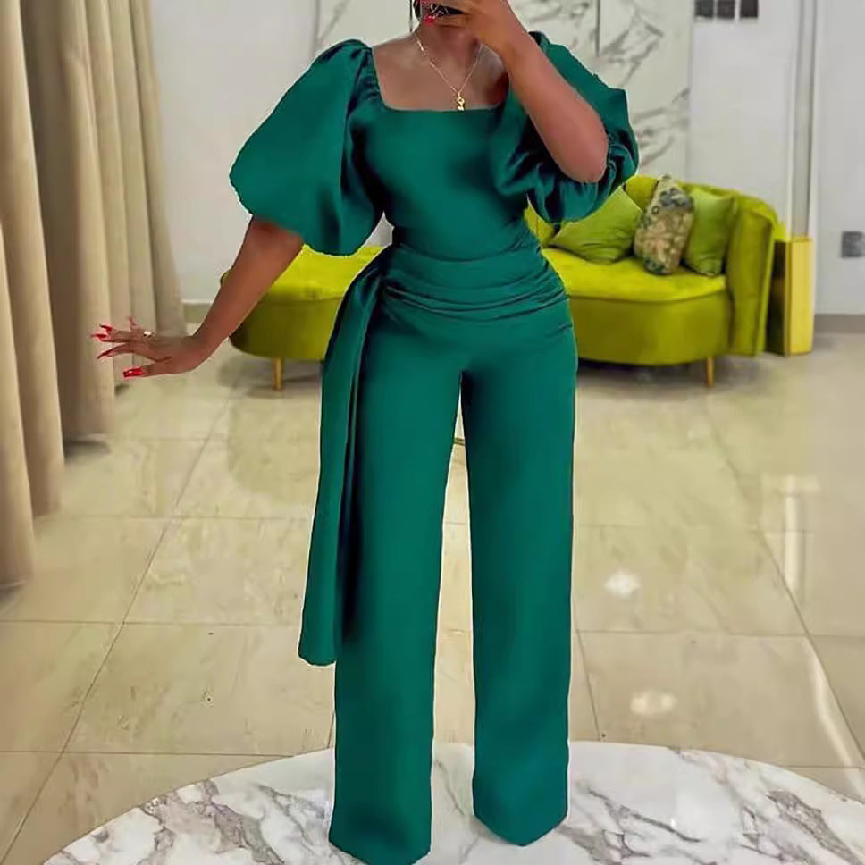 Damen eleganter Jumpsuit mit tailliertem Schnitt und voluminösen Puffärmeln Stalluxe