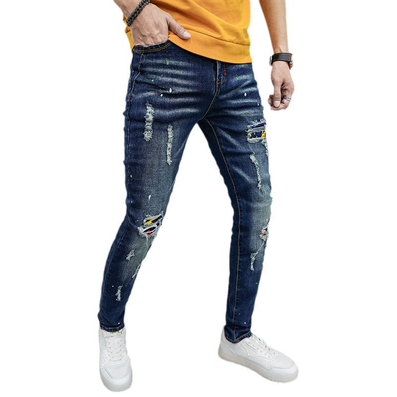 Herren Skinny Fit Jeans mit kreativen Farbklecksen und Rissdesign Stalluxe