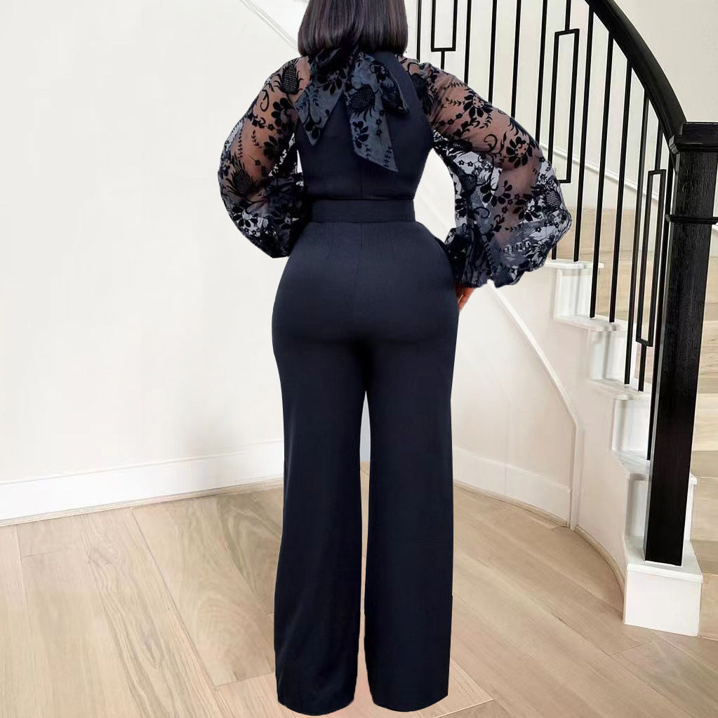 Damen Eleganter Jumpsuit mit transparenter Spitze und Gürtel Stalluxe