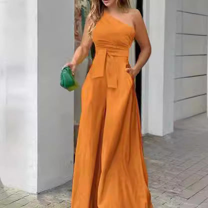 Damen Eleganter Jumpsuit mit asymmetrischem Ausschnitt und Taillengürtel Stalluxe
