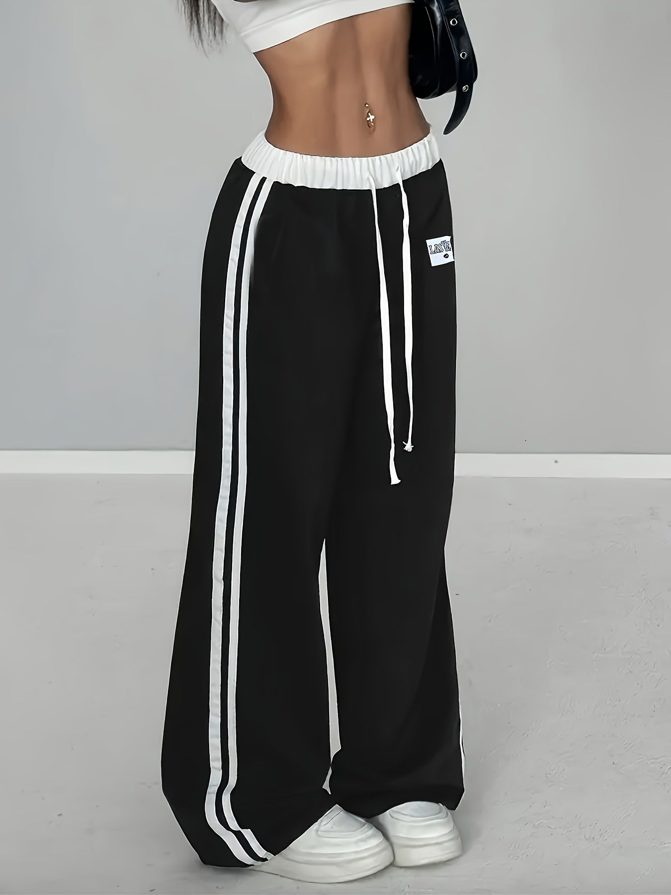 Damen Sportliche weit geschnittene Freizeithose mit elastischem Bund und seitlichen Streifen Stalluxe