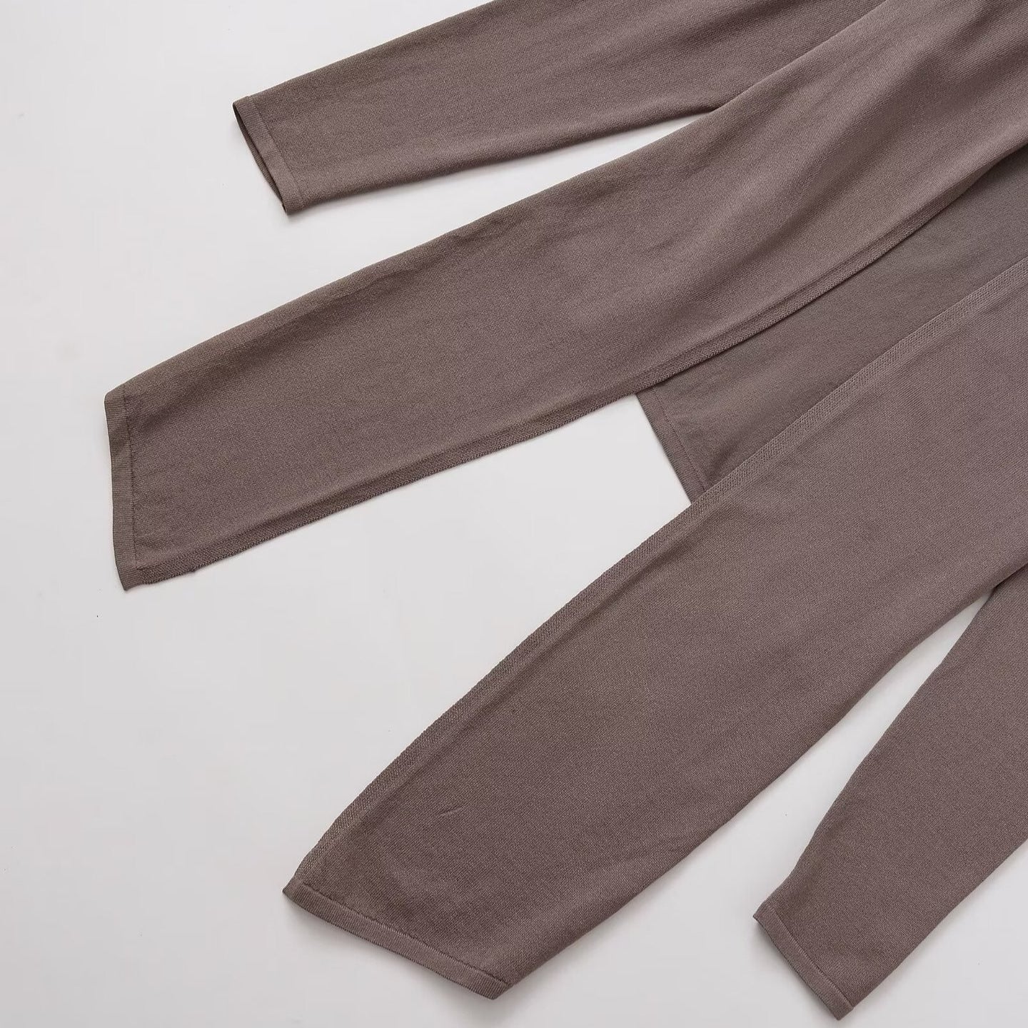 Damen Lässiges Langarmoberteil mit asymmetrischem Saum und hohem Kragen Stalluxe