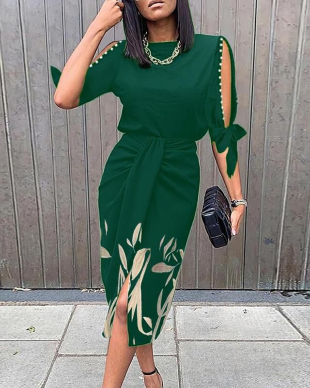 Damen Midikleid mit floralen Details und eleganten Schlitz Stalluxe