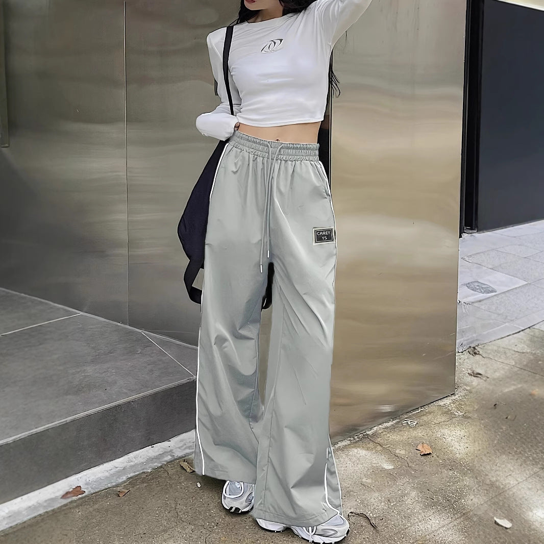 Damen Weite Sporthose mit elastischem Bund und stylischen Details Stalluxe