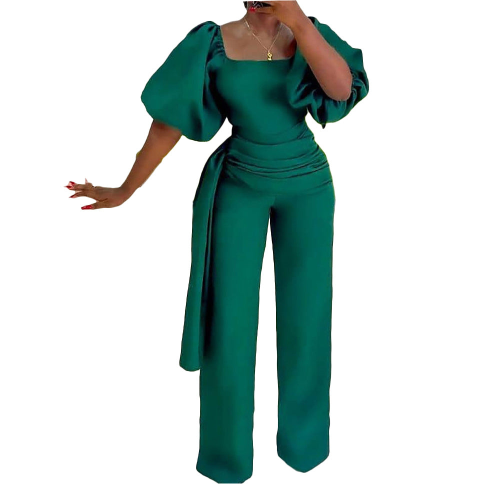 Damen eleganter Jumpsuit mit tailliertem Schnitt und voluminösen Puffärmeln Stalluxe