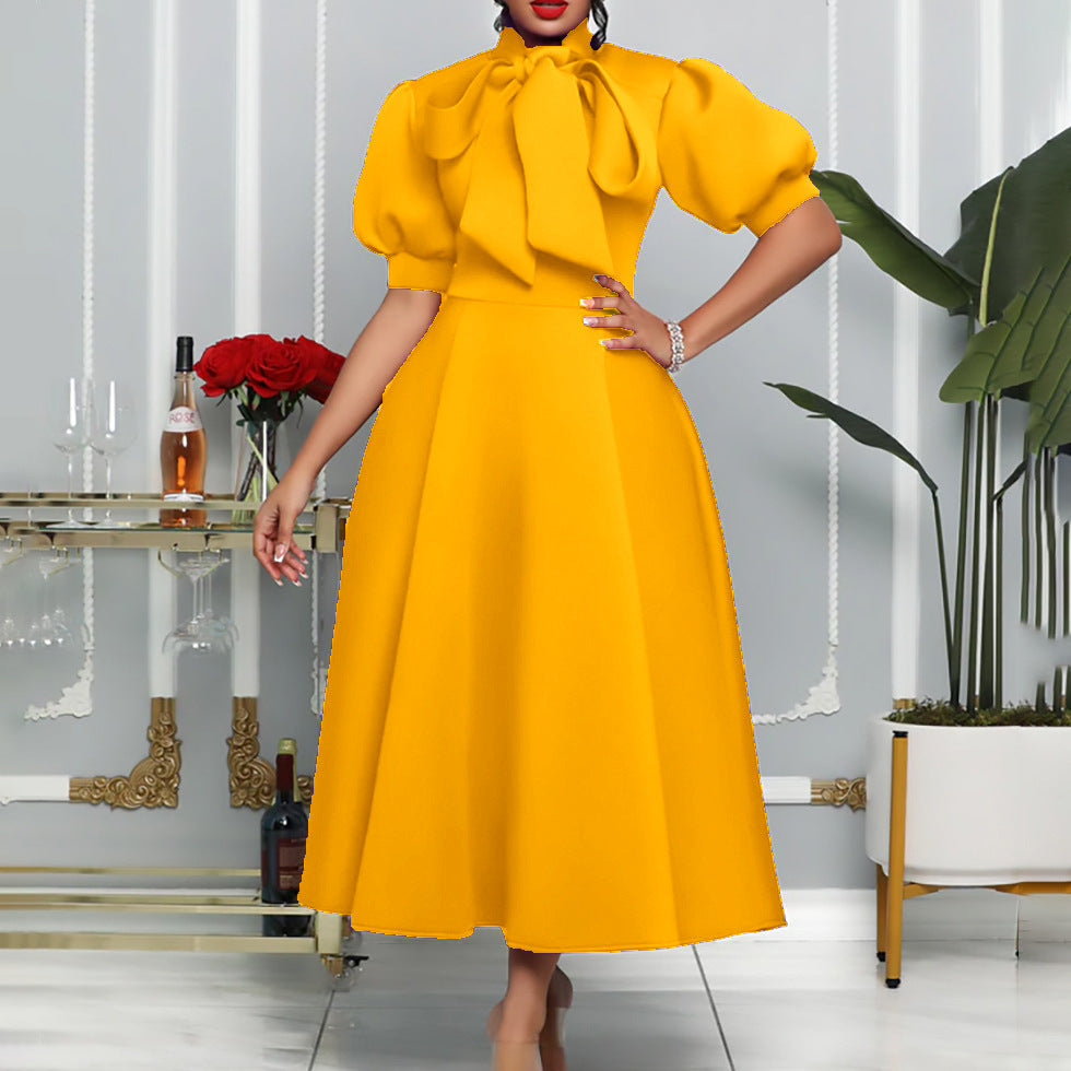 Damen Maxikleid mit voluminösen Puffärmeln und eleganter Schleifenverzierung Stalluxe