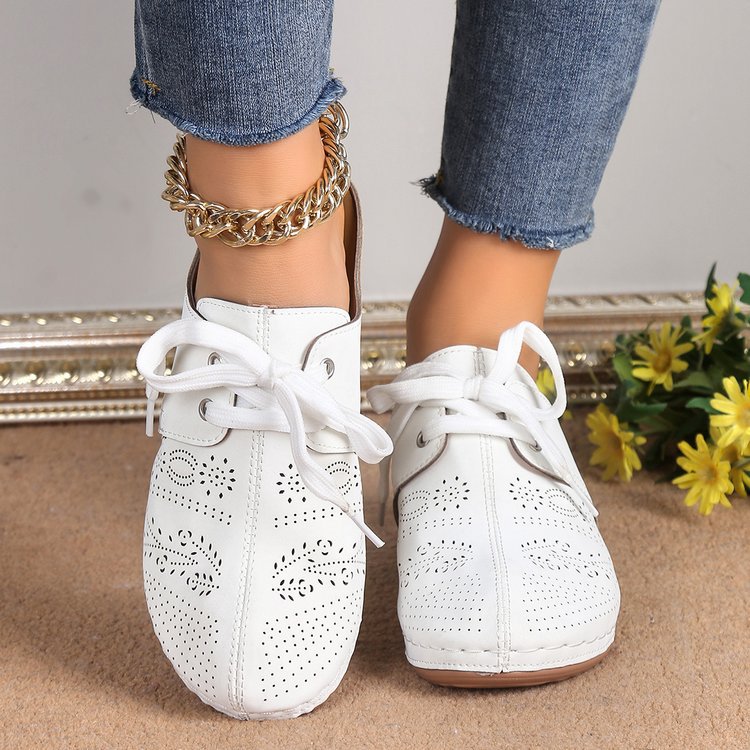 Damen atmungsaktive Sneaker mit nostalgischem Design und feiner Perforation Stalluxe