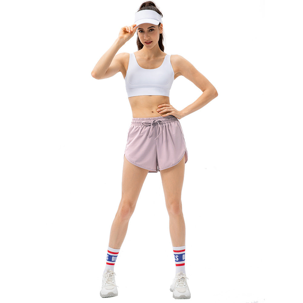 Damen Sportliche Laufshorts mit elastischem Bund und seitlichen Schlitzen Stalluxe