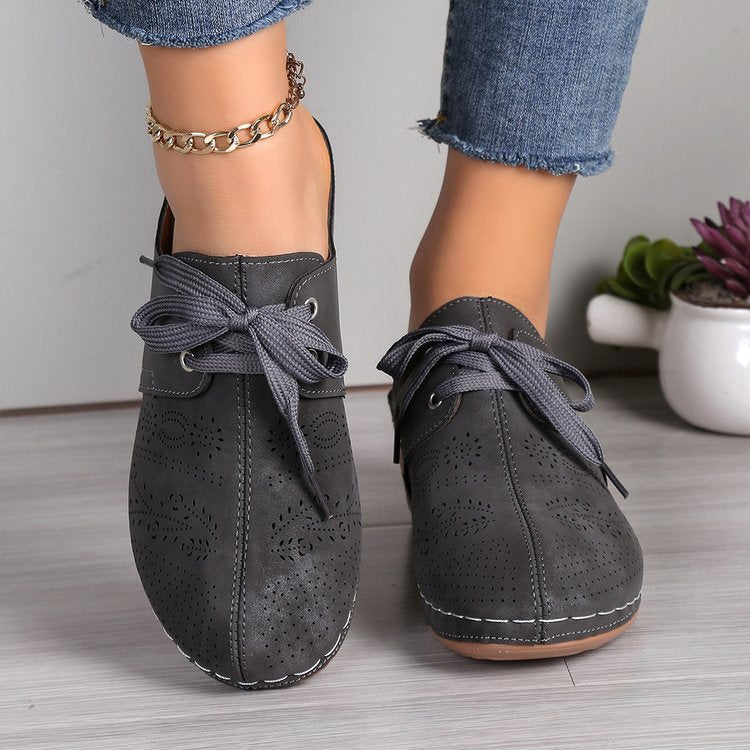 Damen atmungsaktive Sneaker mit nostalgischem Design und feiner Perforation Stalluxe