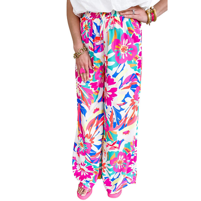 Damen Weit geschnittene Freizeithose mit buntem Blumenmuster und elastischem Bund Stalluxe