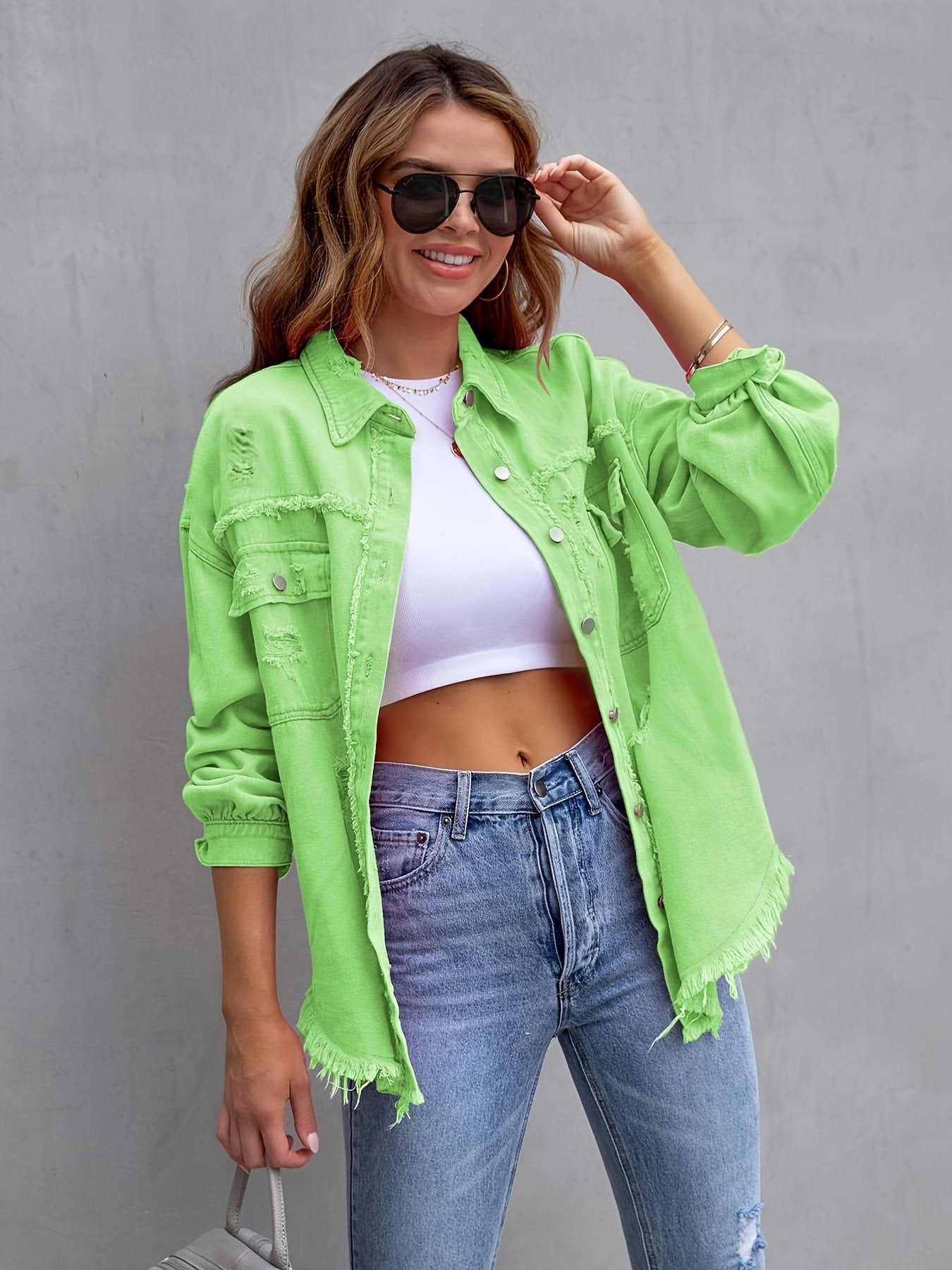 Damen oversized Jeansjacke mit fransigen Säumen und aufgesetzten Taschen Stalluxe
