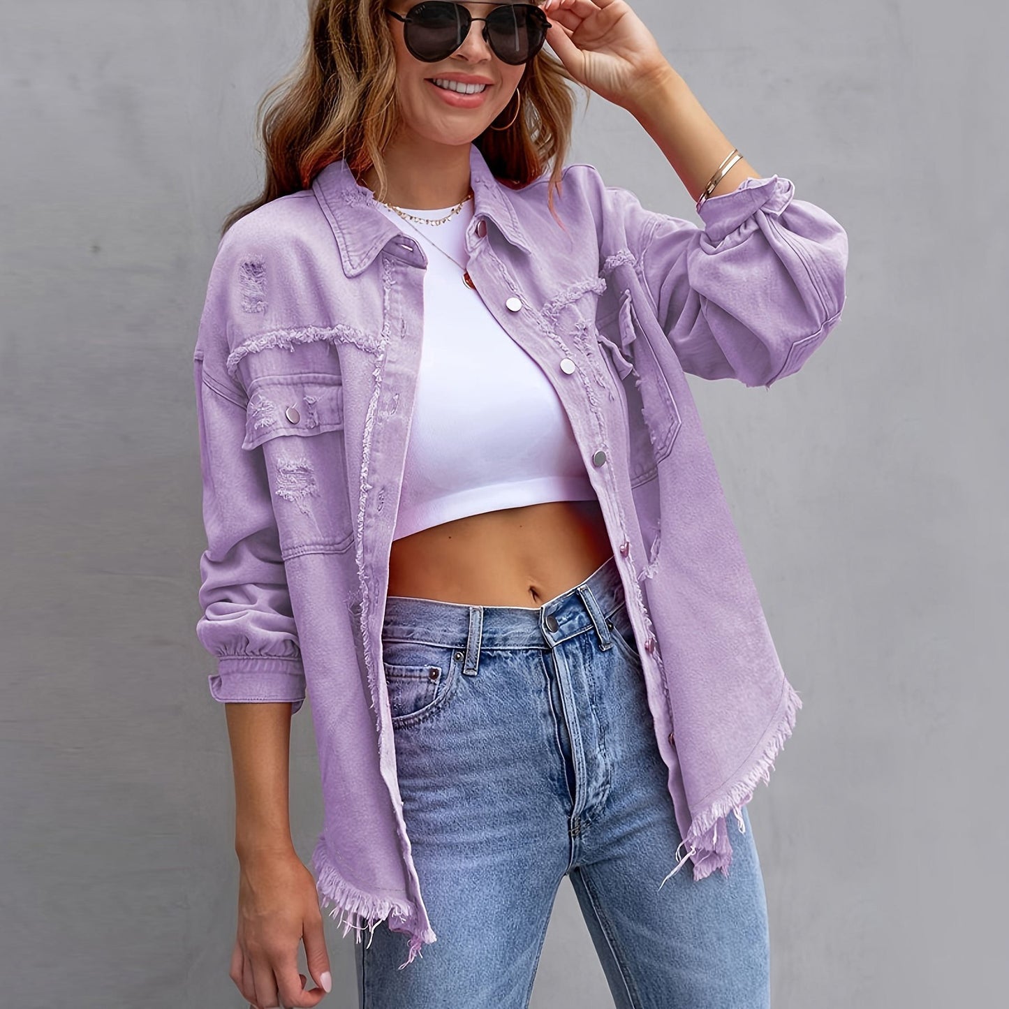 Damen oversized Jeansjacke mit fransigen Säumen und aufgesetzten Taschen Stalluxe