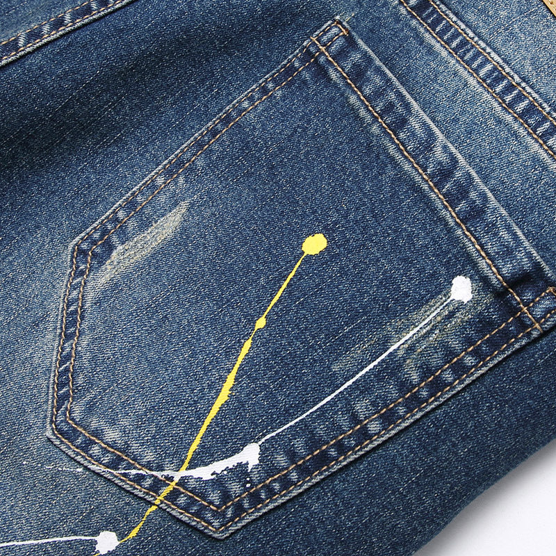 Herren kreative Ripped Jeans mit einzigartigen Farbklecksen Stalluxe