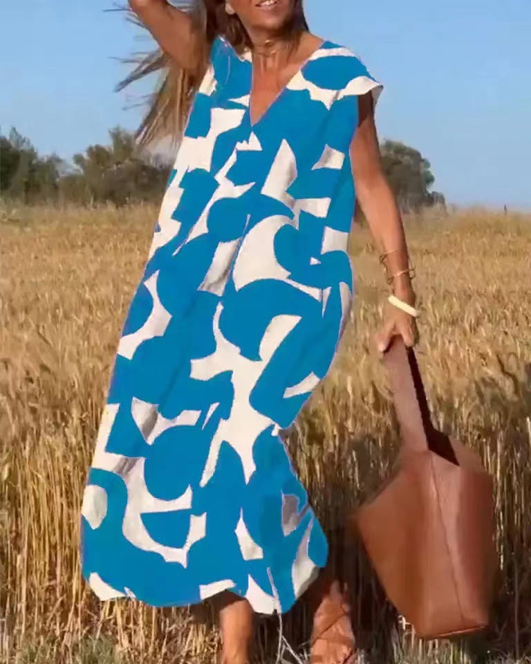 Damen lässiges Maxikleid mit kreativem Muster und tiefem V-Ausschnitt Stalluxe