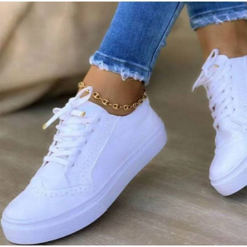 Damen sportive Sneaker mit dekorativen Broguing-Details und atmungsaktiver Sohle Stalluxe