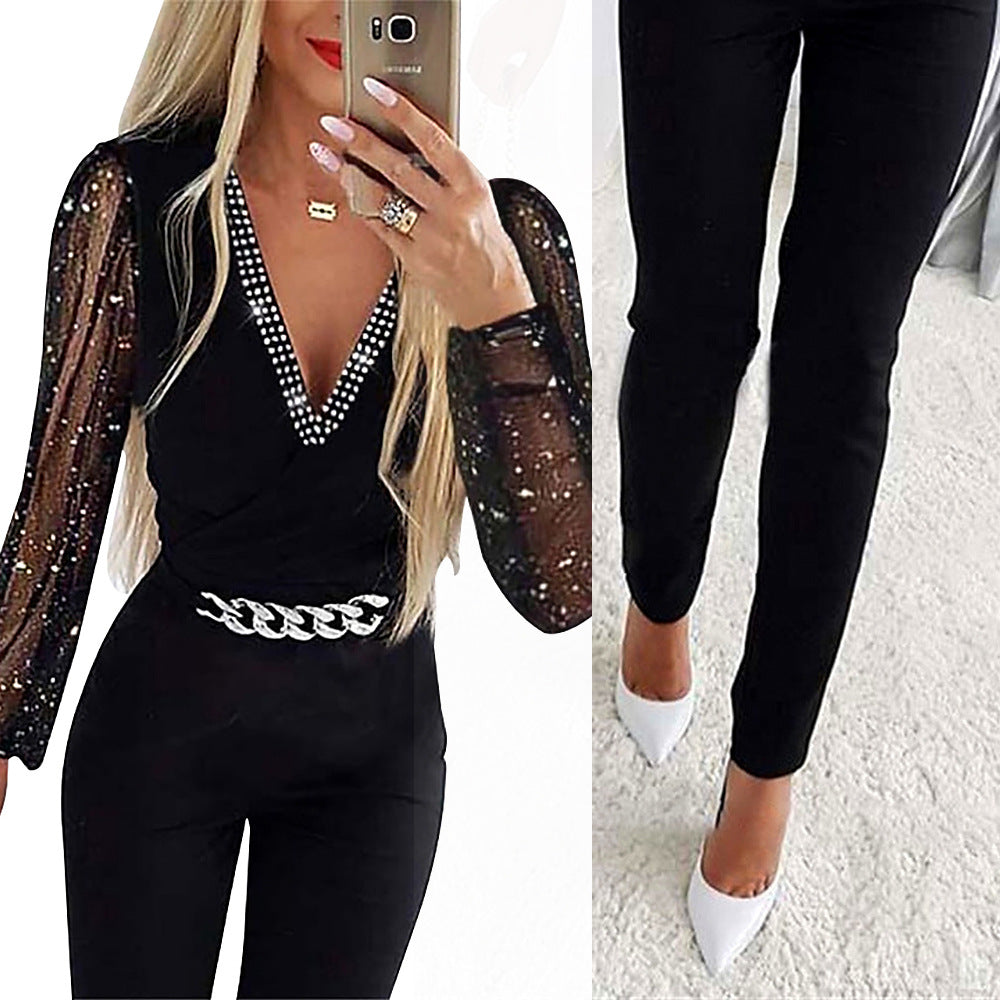 Damen Eleganter Jumpsuit mit transparenten Puffärmeln und Glitzerakzenten Stalluxe