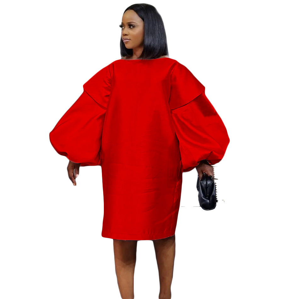 Damen elegantes Kleid mit schwingenden Volumenärmeln Stalluxe