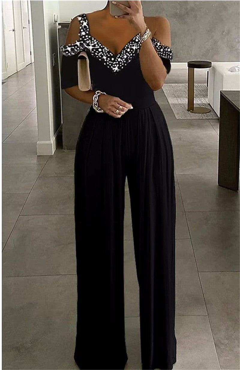 Damen eleganter Jumpsuit mit schulterfreier Gestaltung und glitzerndem Dekolleté Stalluxe