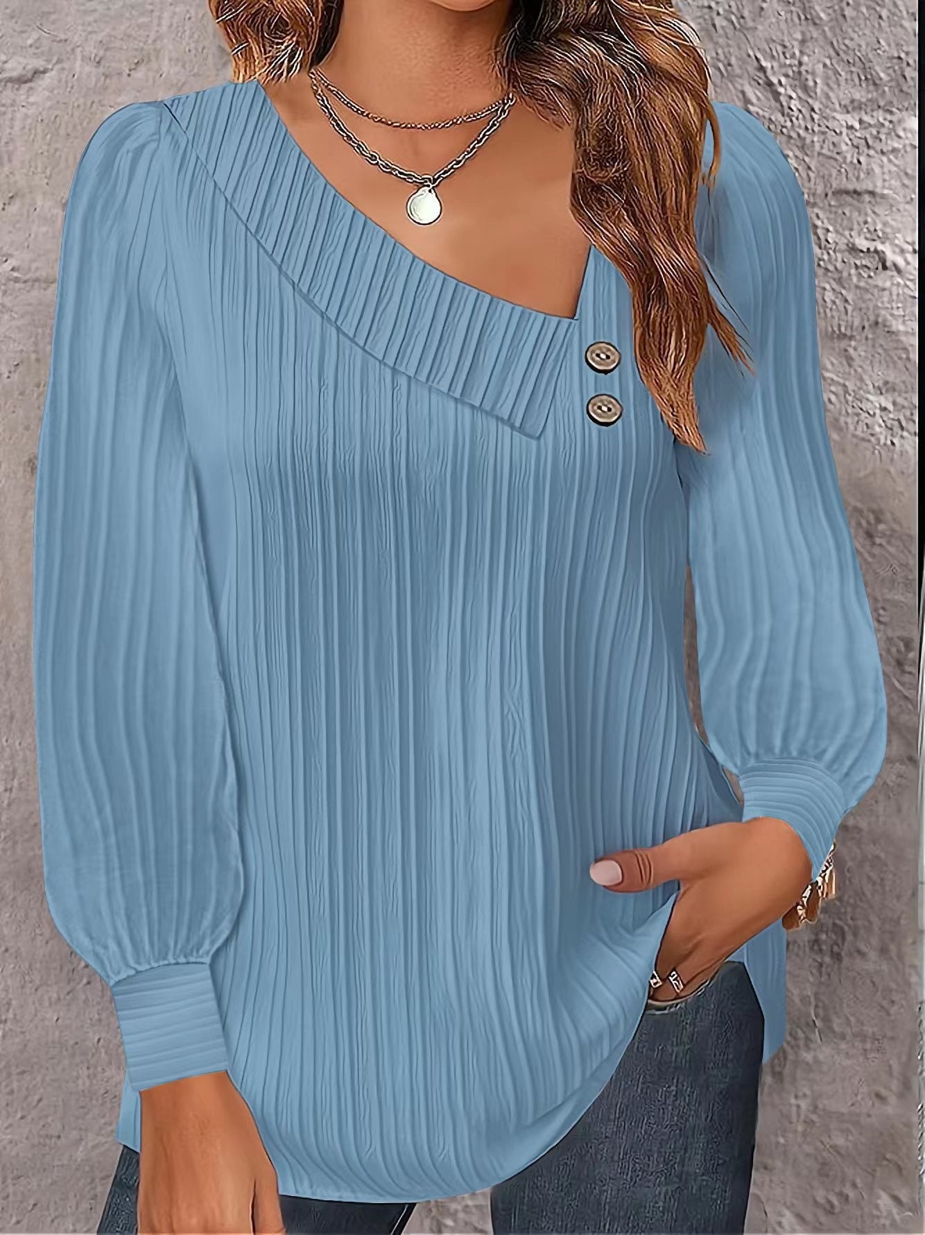 Damen Modisches Langarmshirt mit plissierter Textur und dekorativen Knöpfen Stalluxe