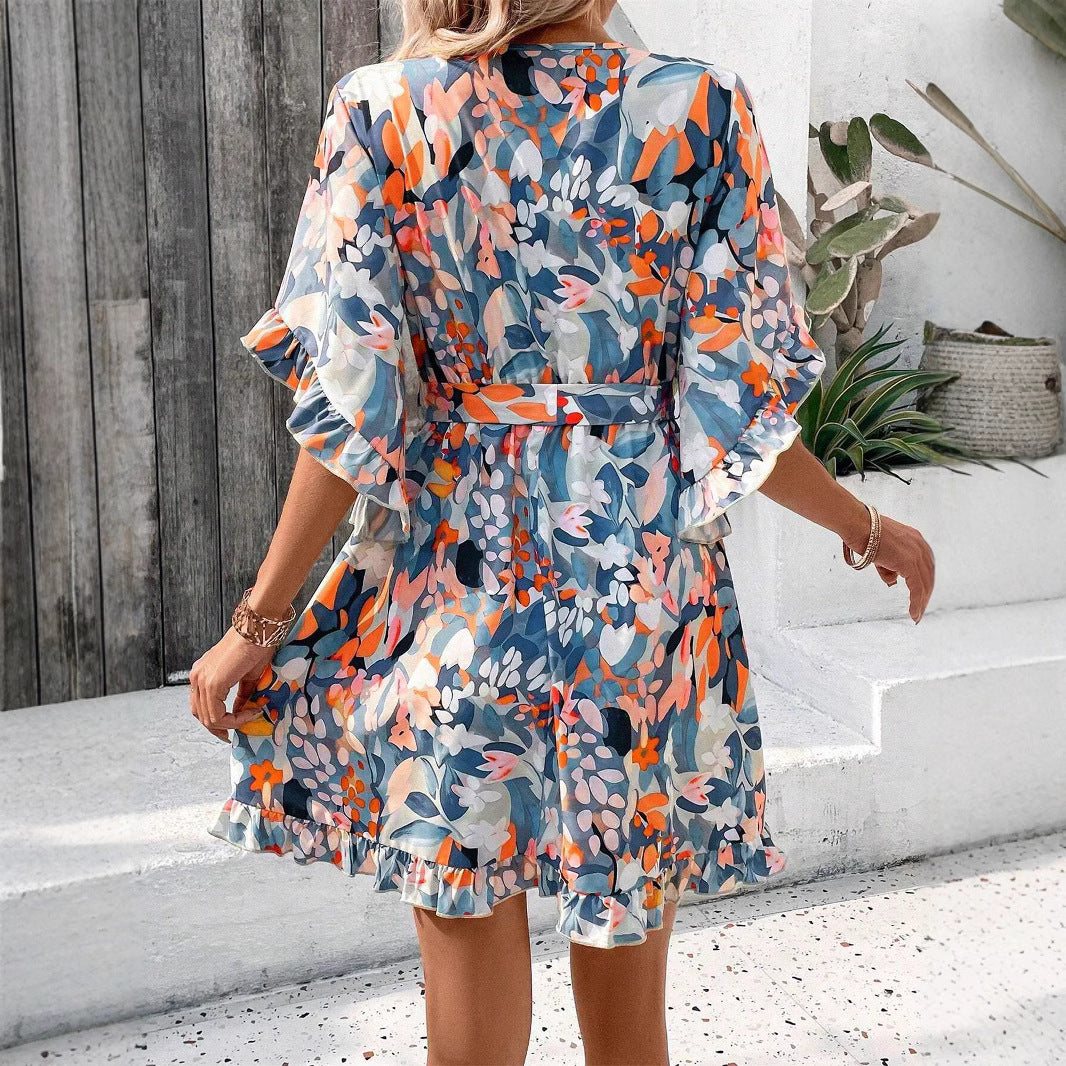 Damen Wickelkleid mit floralen Motiven und luftigen Ärmeln Stalluxe