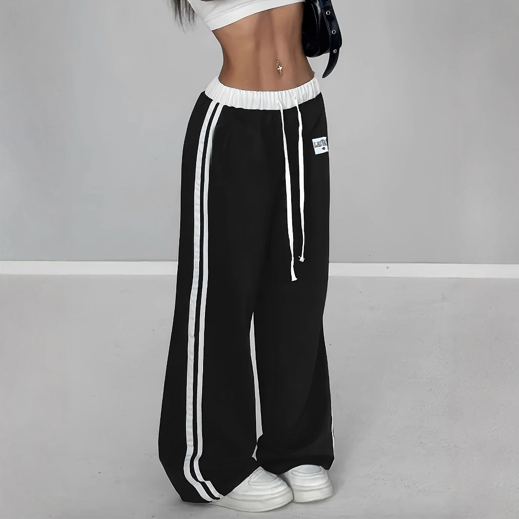 Damen Sportliche weit geschnittene Freizeithose mit elastischem Bund und seitlichen Streifen Stalluxe