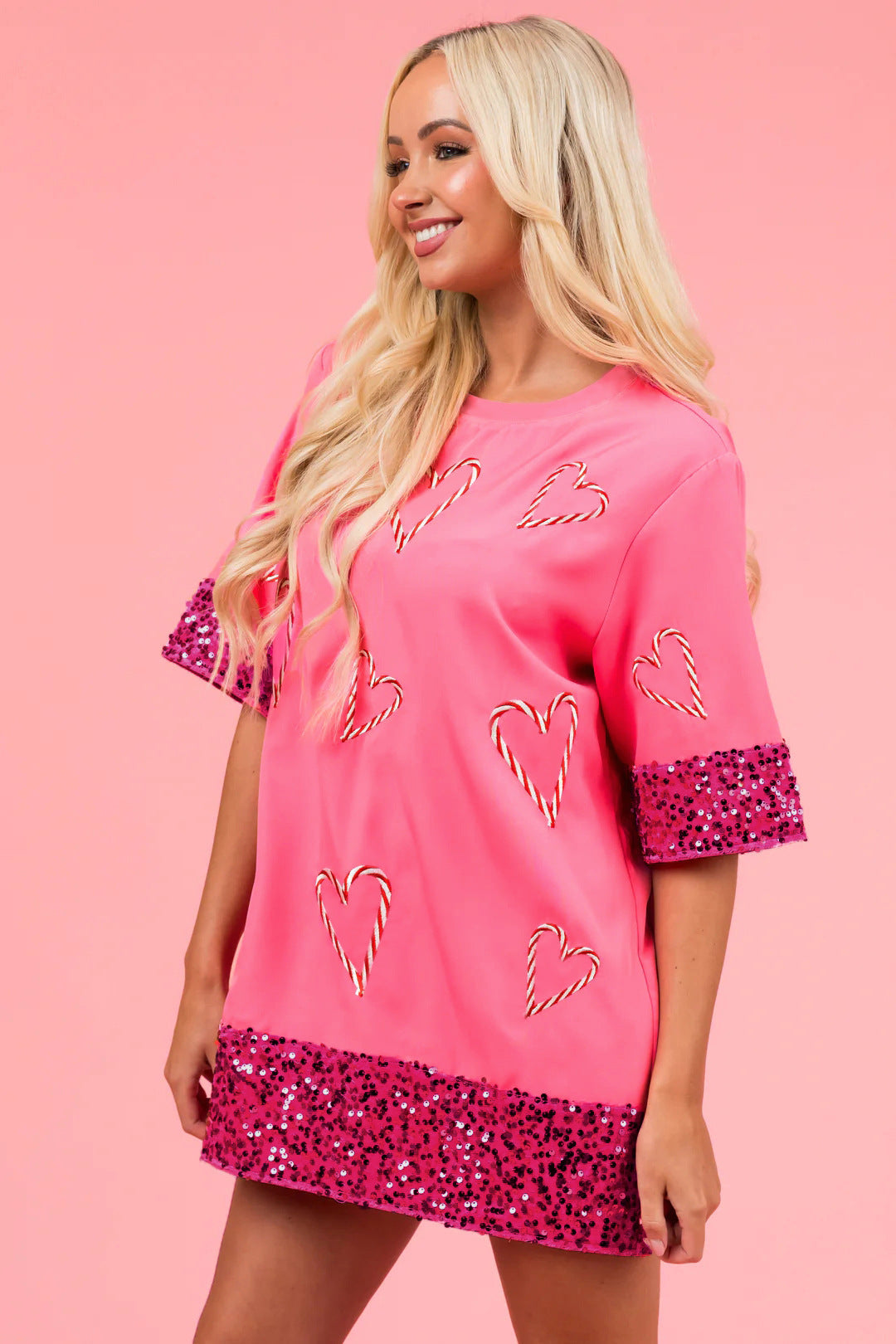 Damen Sportliches T-Shirt mit frechem Herzmotiv und glitzernden Ärmeln Stalluxe
