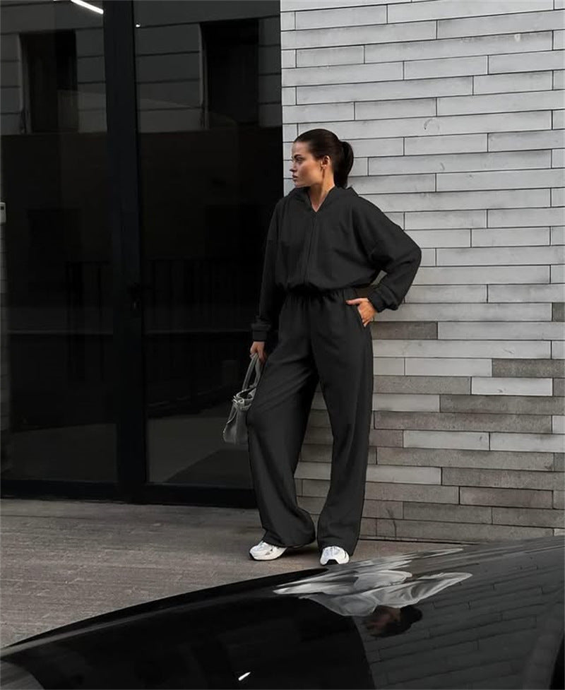 Damen Lässiger Fleece-Jumpsuit mit Kapuze und praktischen Taschen Stalluxe