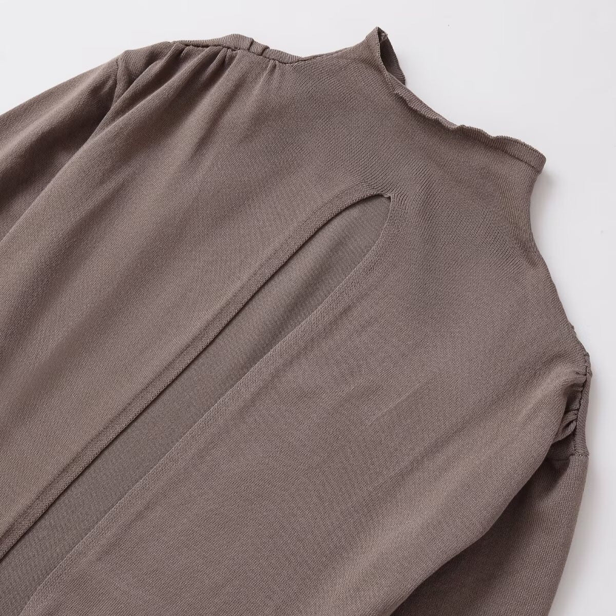 Damen Lässiges Langarmoberteil mit asymmetrischem Saum und hohem Kragen Stalluxe