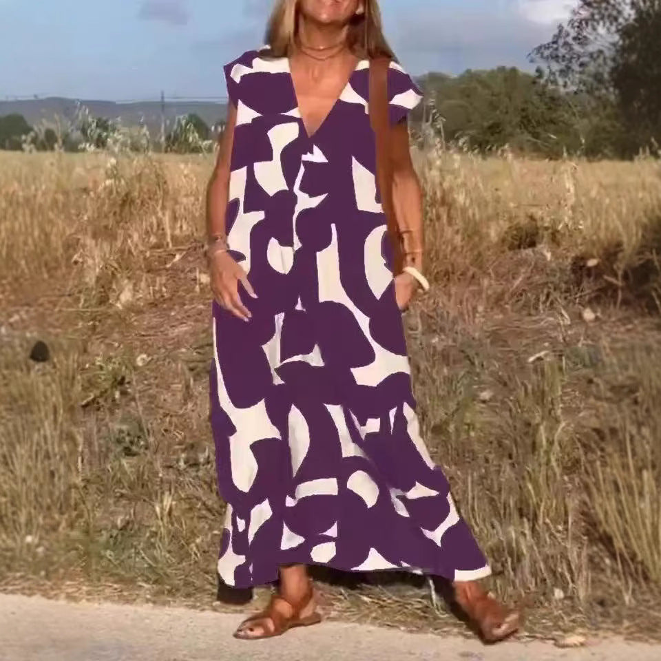Damen lässiges Maxikleid mit kreativem Muster und tiefem V-Ausschnitt Stalluxe