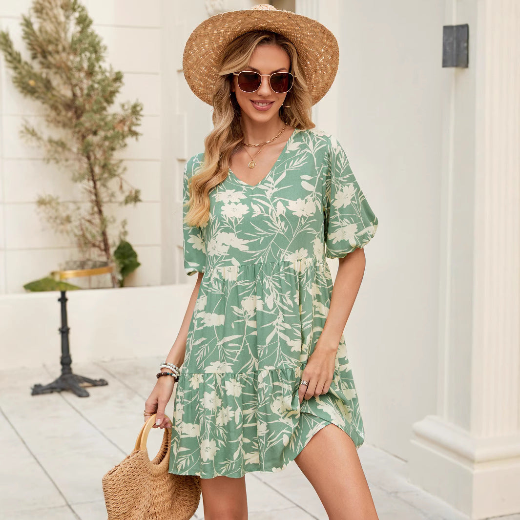 Damen V-Ausschnitt Sommerkleid mit voluminösen Ärmeln und floralem Design Stalluxe