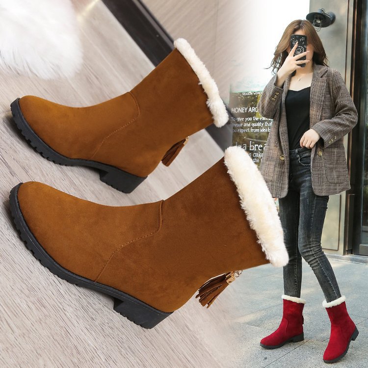 Damen Winterliche Stiefel mit weichem Kunstfellkragen und trendigen Fransenapplikationen Stalluxe