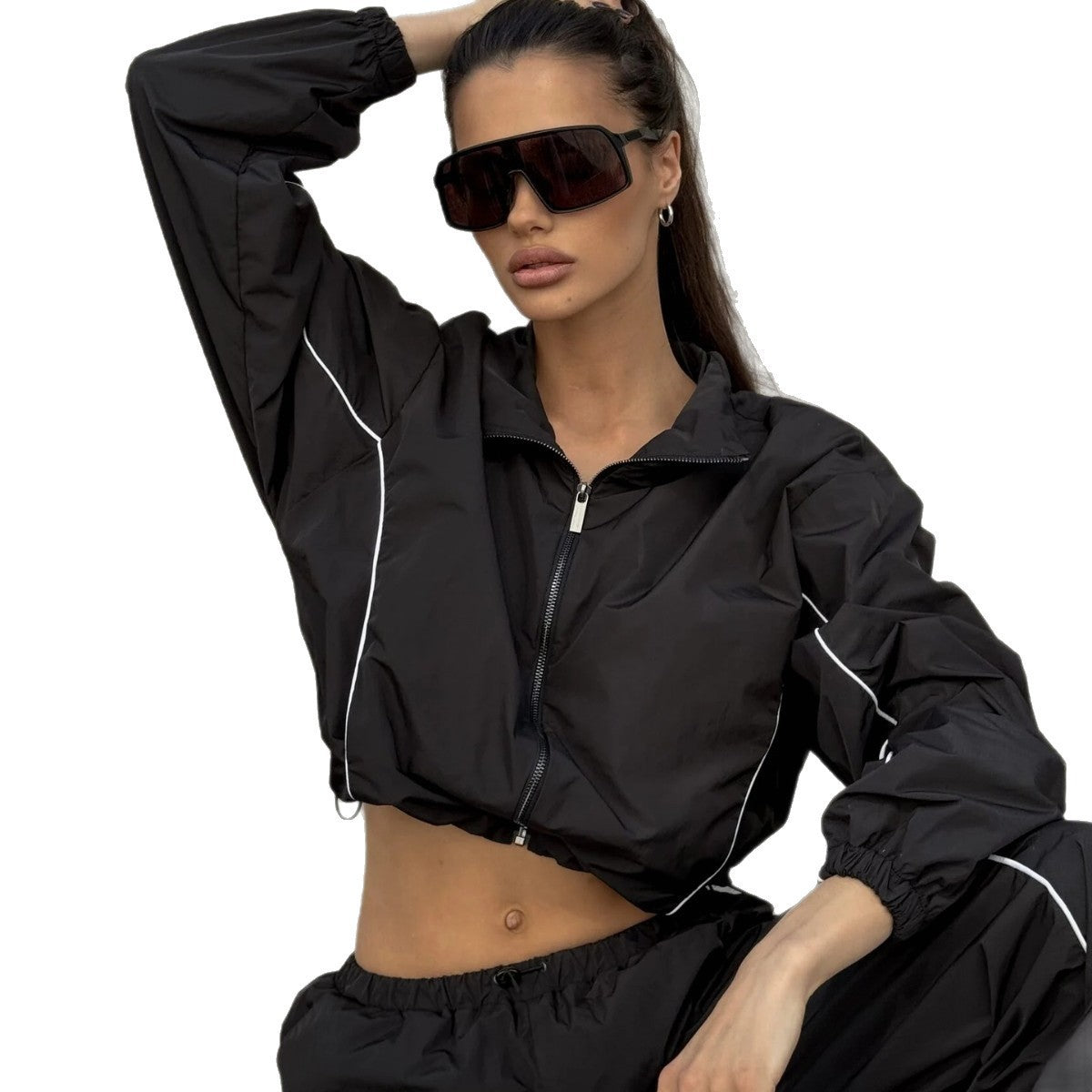 Damen funktionale Windjacke mit kurzem Schnitt und reflektierenden Akzenten Stalluxe