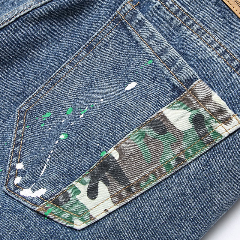 Herren Ripped Denim-Jeans mit kreativen Farbklecksen und lässigem Schnitt Stalluxe