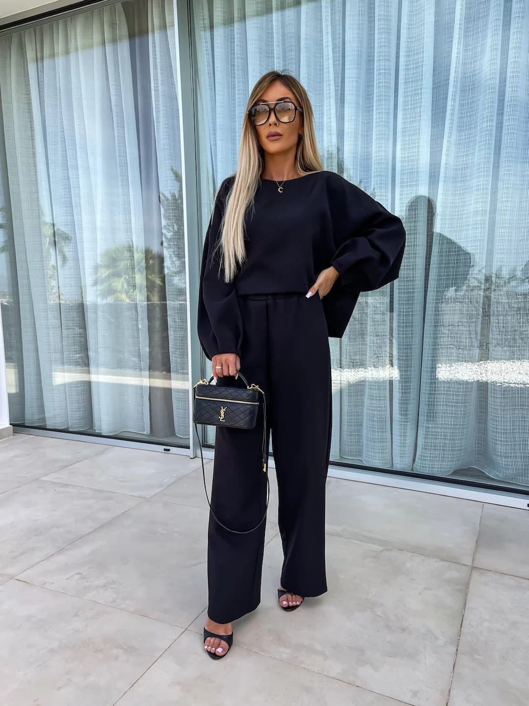 Damen eleganter Jumpsuit mit weitem Schnitt und voluminösen Ärmeln Stalluxe