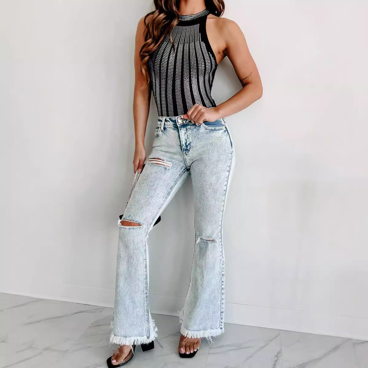 Damen Flared Jeans mit modischen Fransen und Rissen Stalluxe