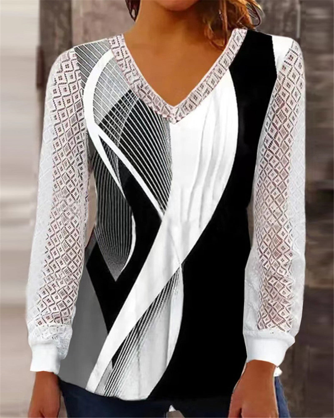 Damen modisches Oberteil mit raffinierten Spitzenärmeln und geometrischem Design Stalluxe