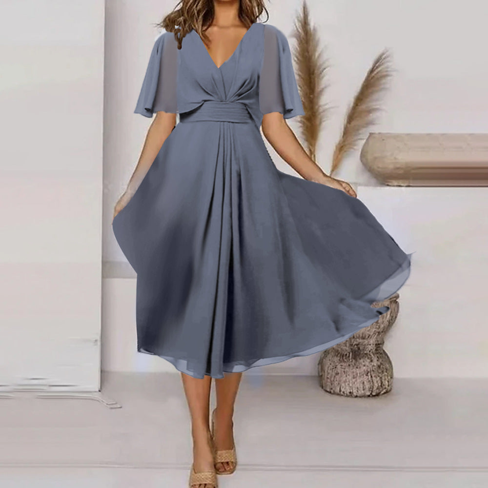 Damen Midikleid mit verspieltem Wickeldesign und eleganten Puffärmeln Stalluxe